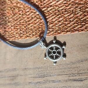 Unisex choker with nautical theme charm on a blue gray nylon coated leather cord